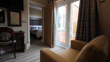 Suite (Plus up to 1 person with Single Chair Bed at additional cost of £10 per night) | Desk, free cribs/infant beds, rollaway beds, free WiFi