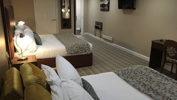 Deluxe Family Room for 2 adults and 2 children additional cost of £10 per night double sofa bed | Desk, free cots/infant beds, rollaway beds, free WiFi