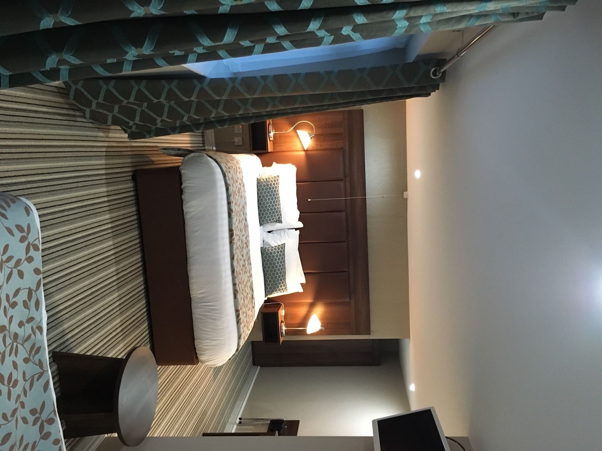 deluxe family room for 2 adults and 2 children additional cost of £10 per night double sofa bed	 | desk, free cots/infant beds, rollaway beds, free wifi