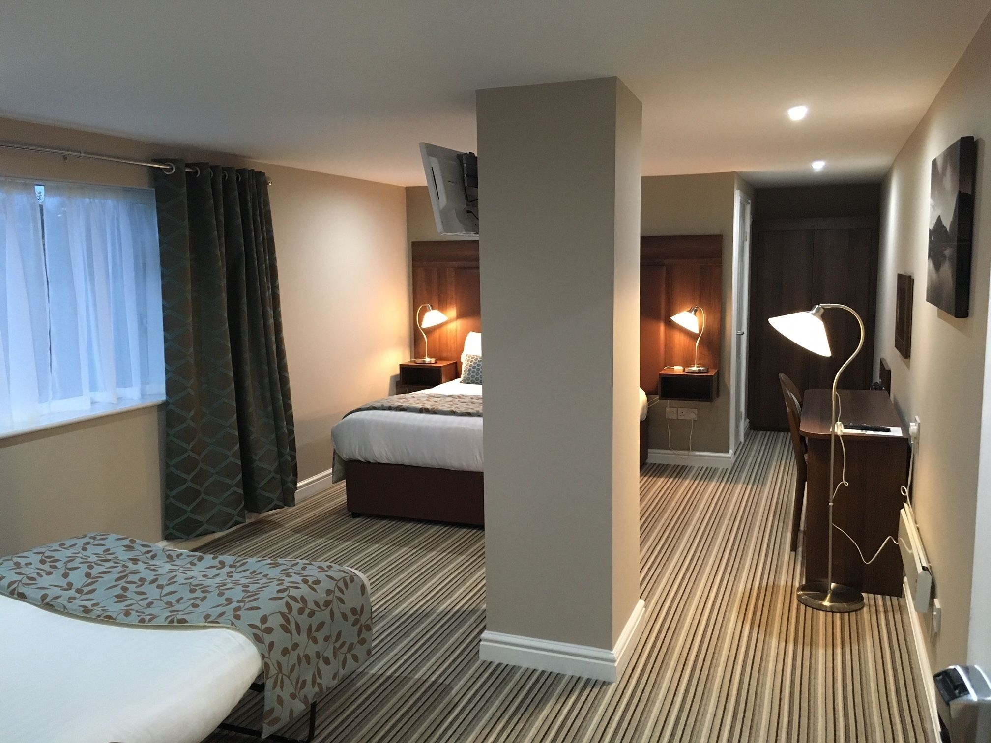 deluxe family room for 2 adults and 2 children additional cost of £10 per night double sofa bed	 | desk, free cots/infant beds, rollaway beds, free wifi