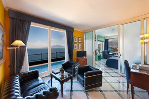 Suite, Balcony, Sea View | Living area | Flat-screen TV