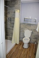 Standard Room, 2 Double Beds, Smoking | Bathroom | Hair dryer, towels