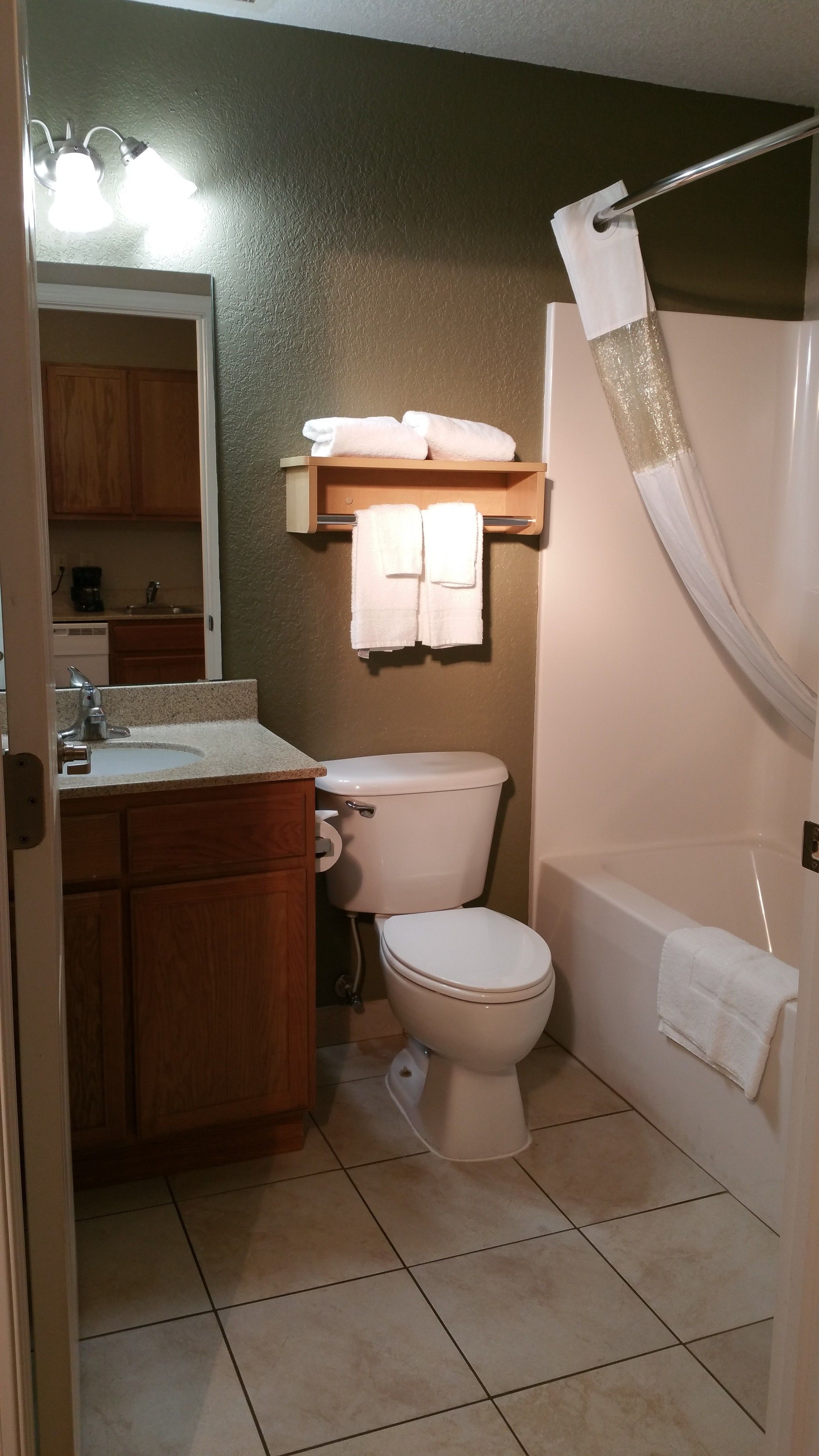 combined shower/bathtub, free toiletries, hair dryer, towels