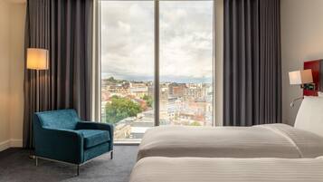 Premium bedding, in-room safe, desk, soundproofing