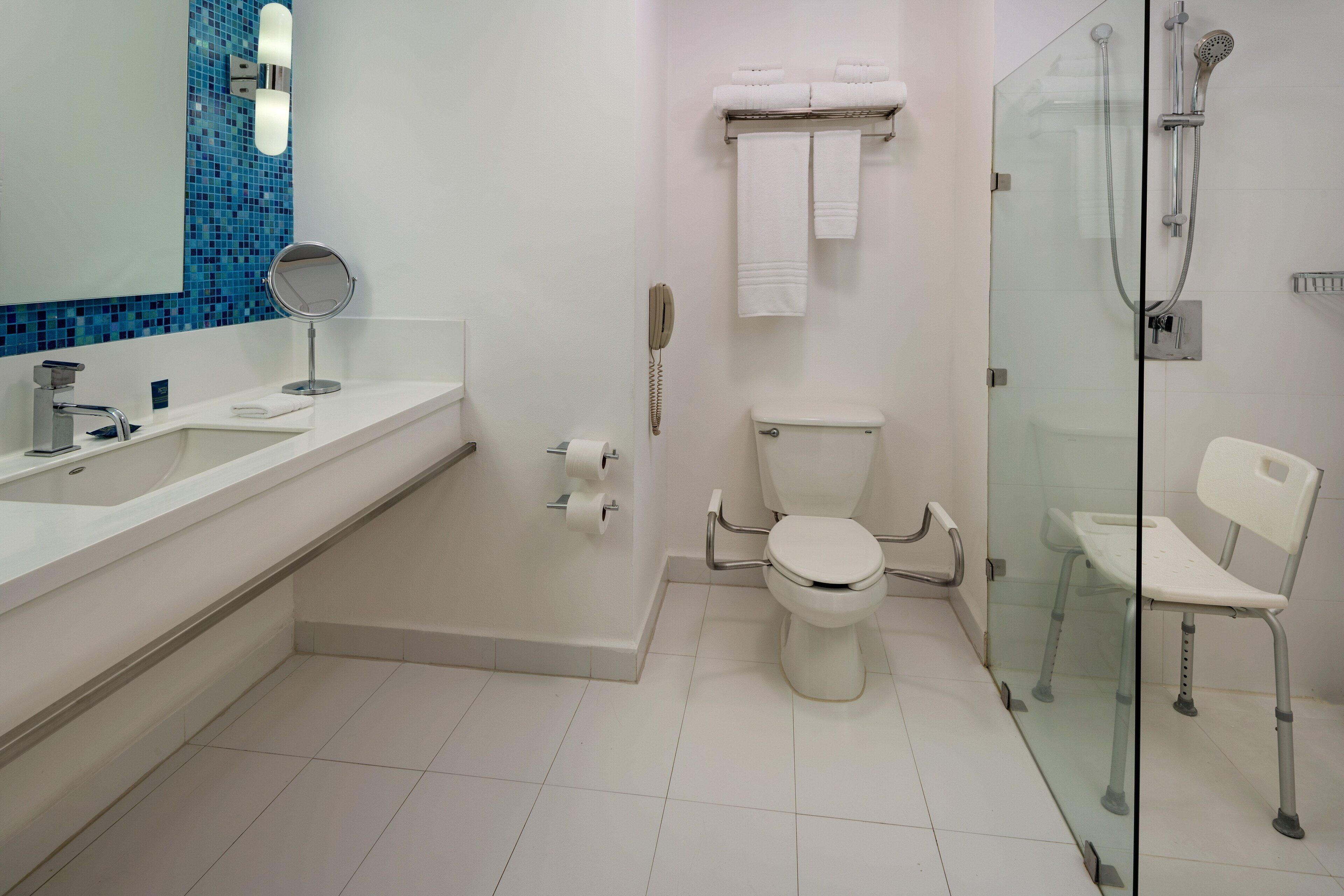 deluxe room, 1 king bed, non smoking | bathroom | shower, eco-friendly toiletries, hair dryer, towels