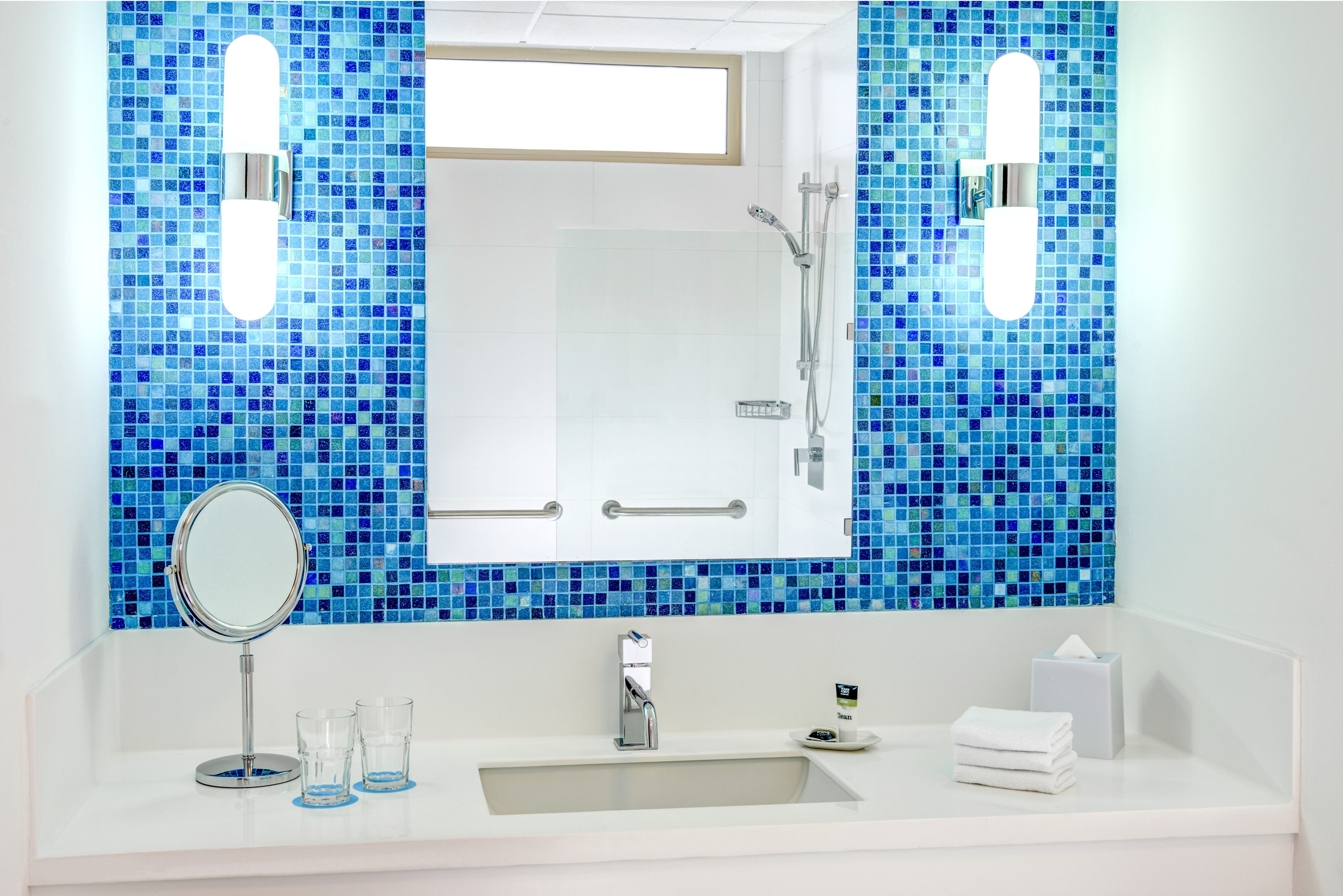 shower, eco-friendly toiletries, hair dryer, towels