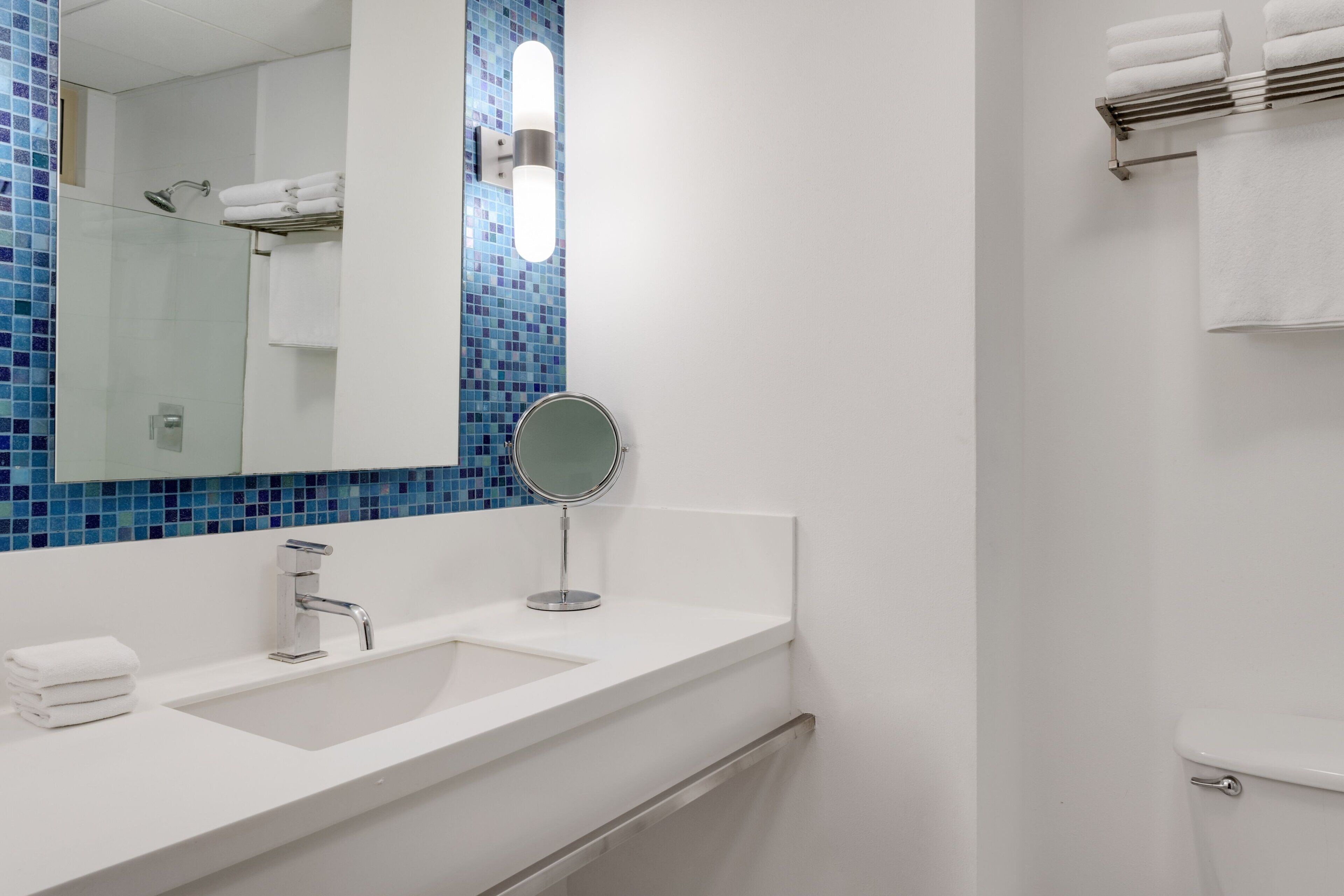 shower, eco-friendly toiletries, hair dryer, towels