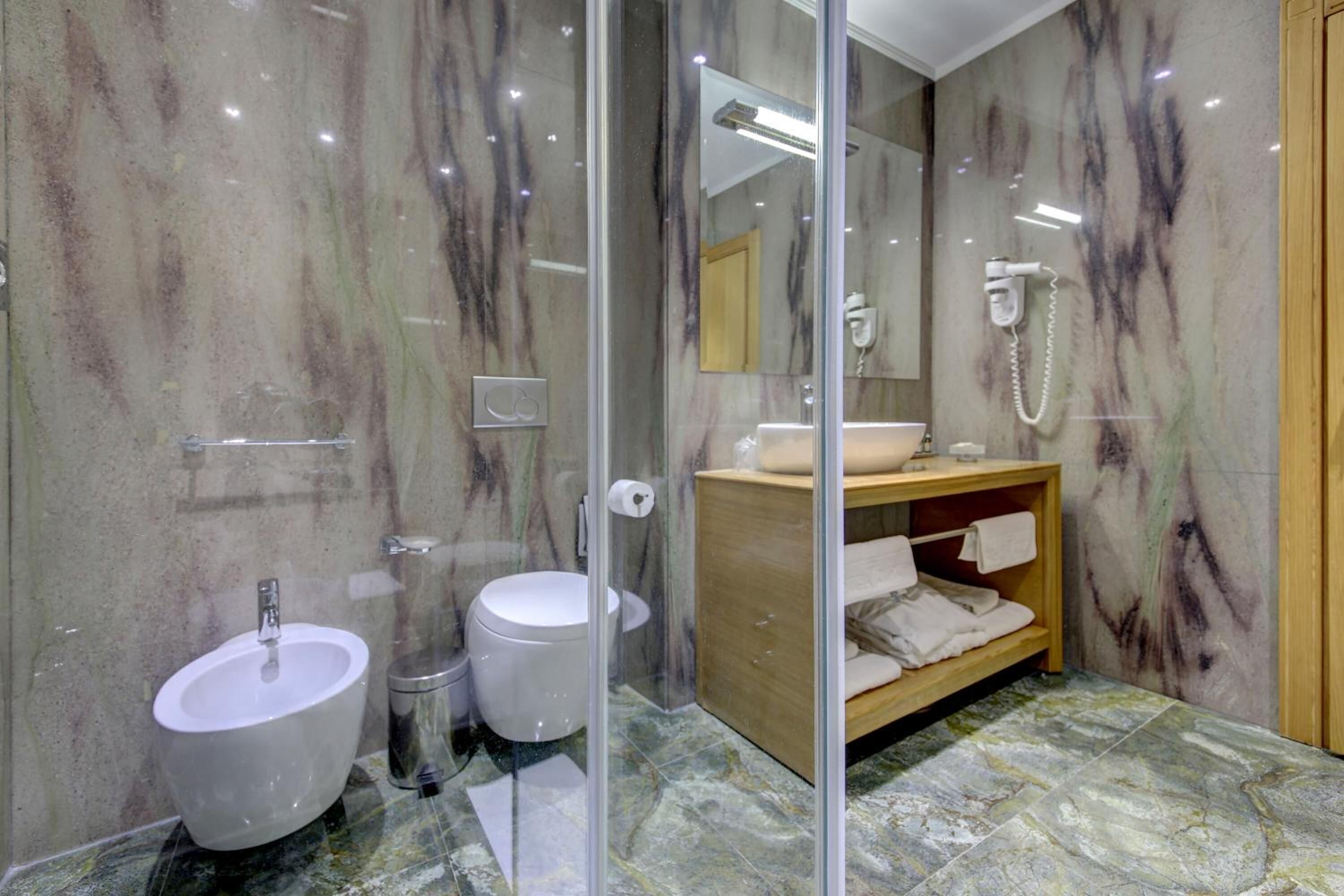 shower, free toiletries, hair dryer, bathrobes