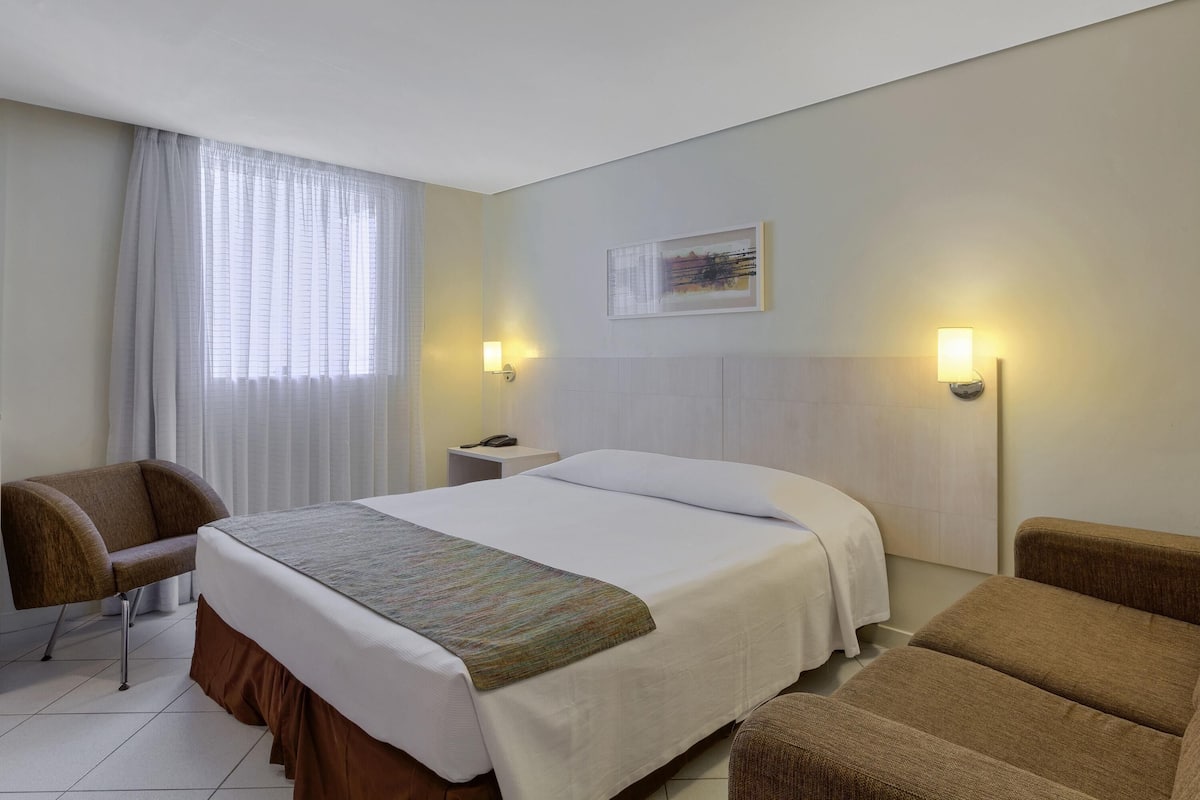 Departamento estándar, 1 cama matrimonial | Minibar, caja de seguridad en la habitación y escritorio