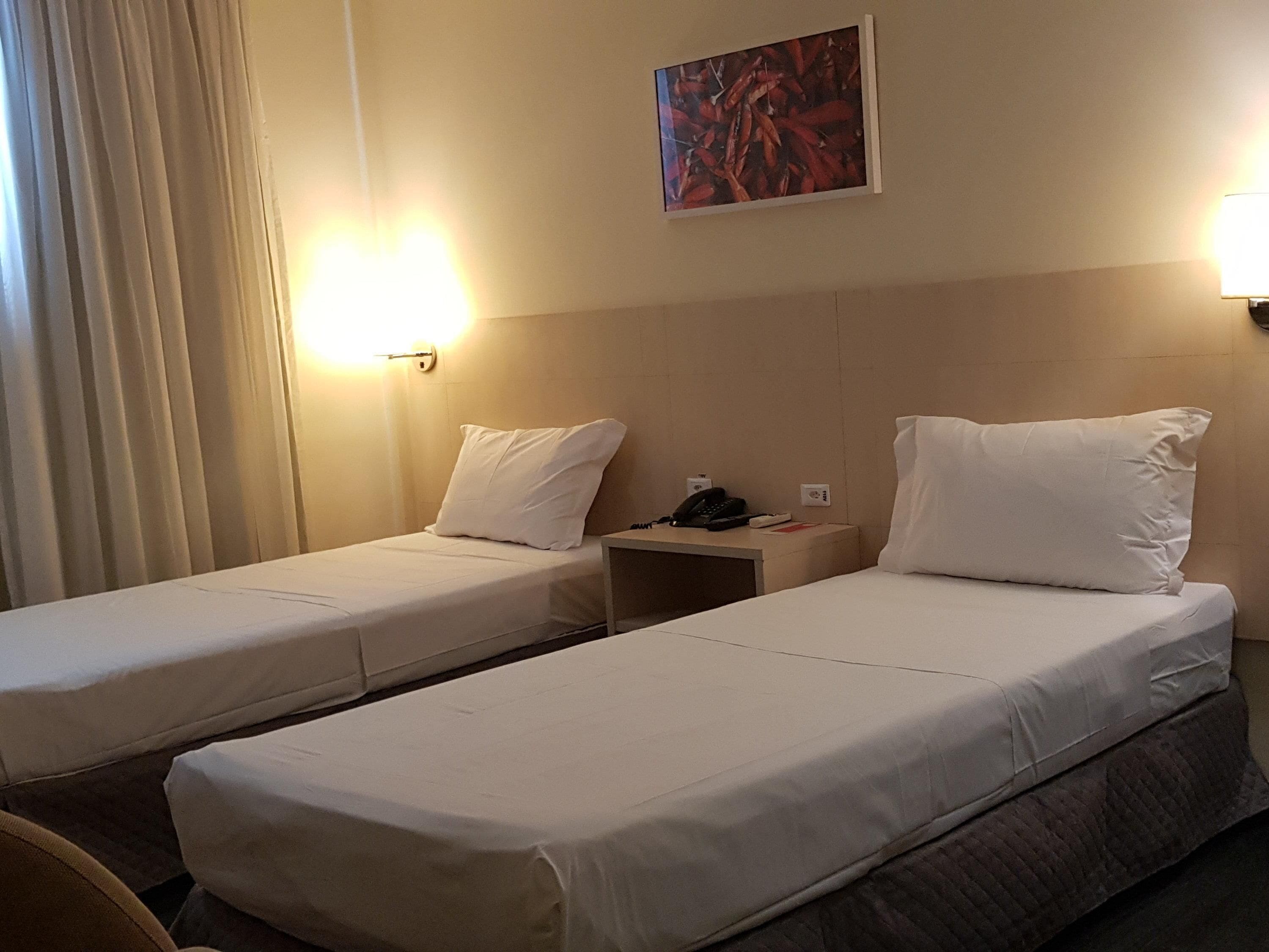 standard apartment, 2 single beds | minibar, in-room safe, desk, free cots/infant beds