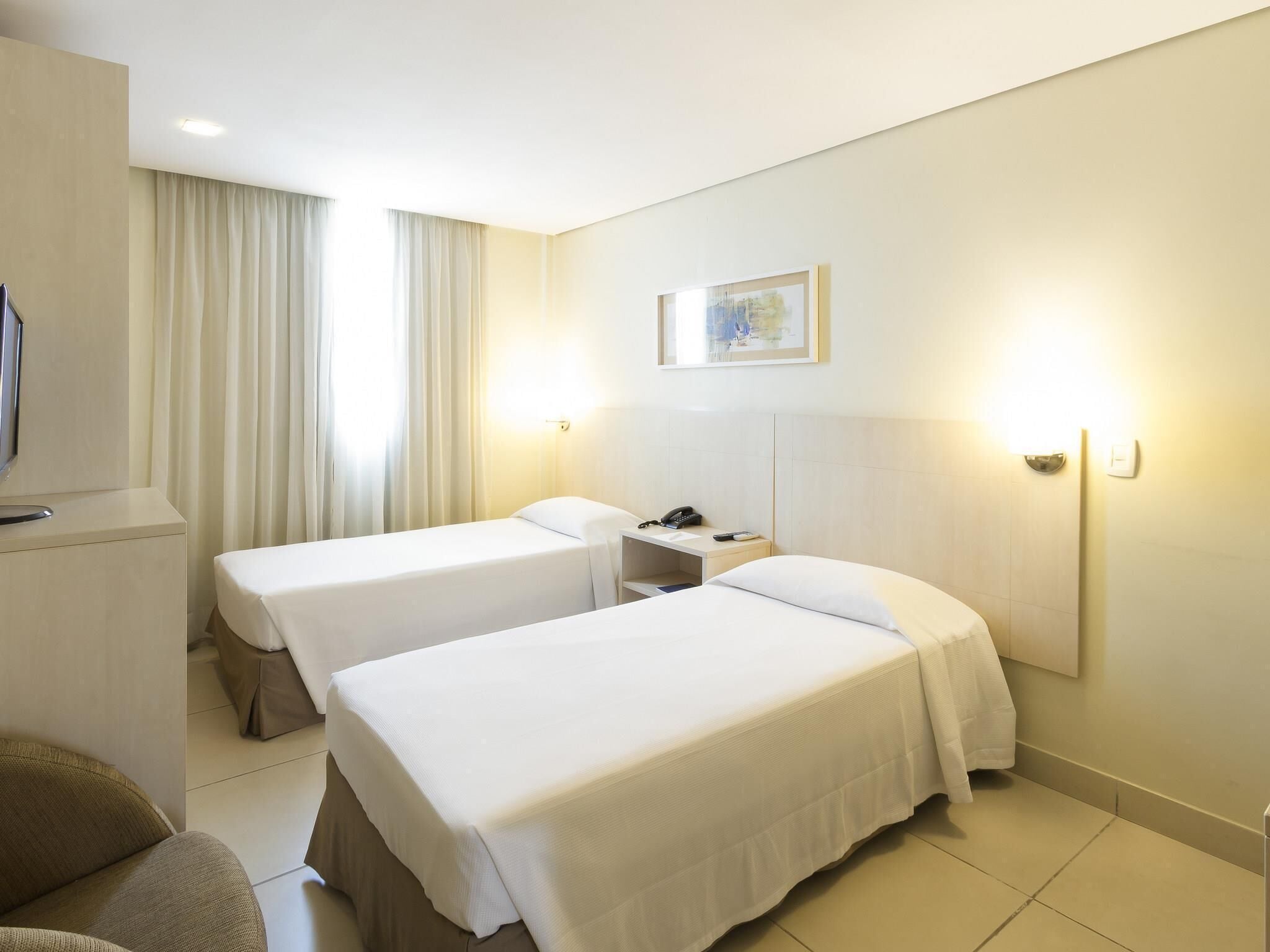 Standard Apartment, 2 Twin Beds | Minibar, in-room safe, desk, free cribs/infant beds