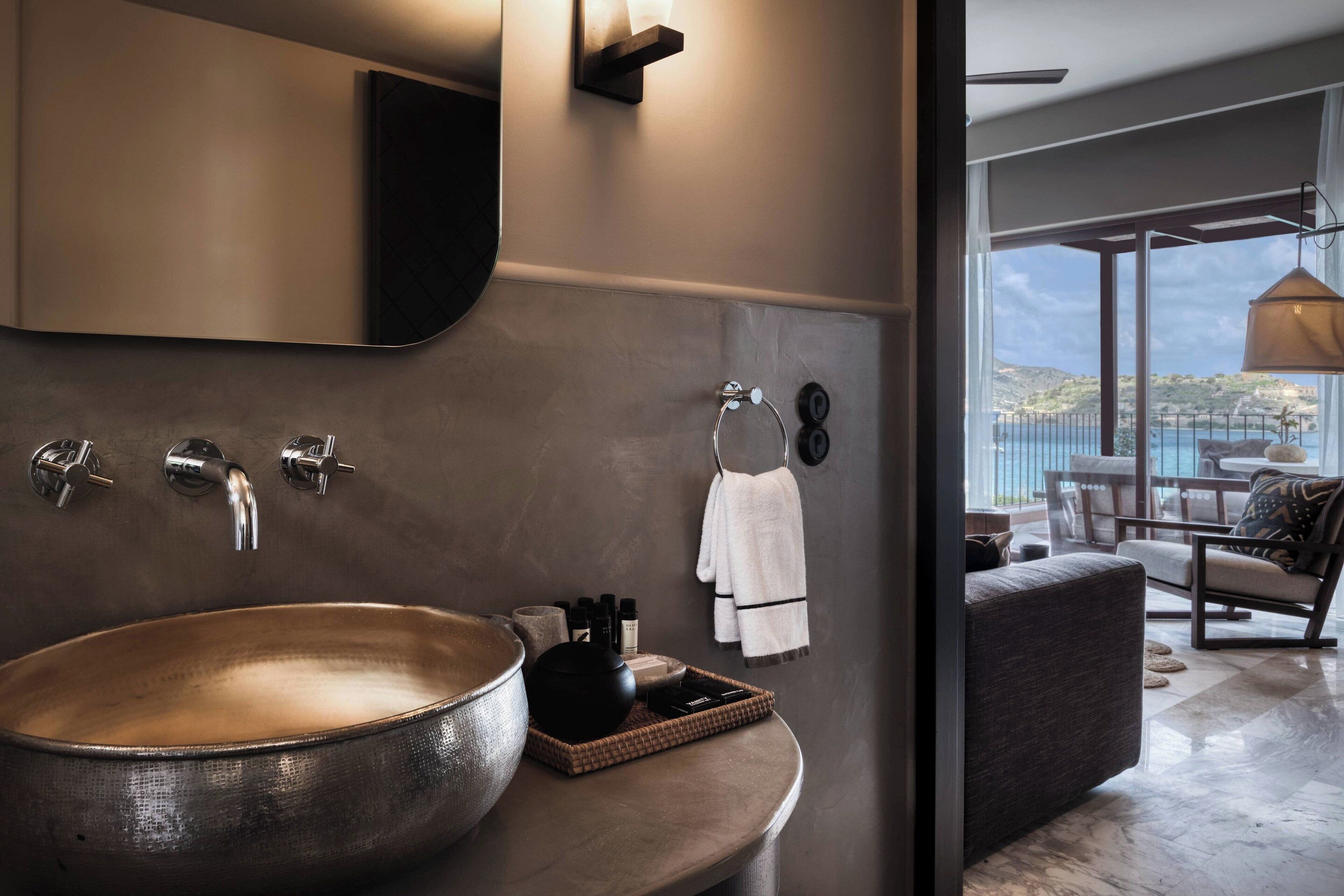 designer toiletries, hair dryer, bathrobes, slippers