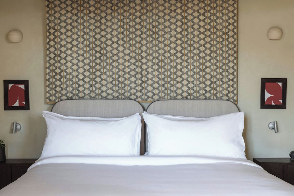 1 chambre, literie de qualité, couette en duvet, minibar