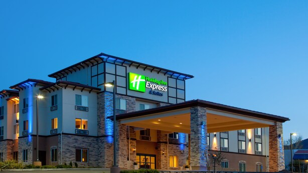 A Holiday Inn Express building with a modern design, featuring a covered entrance and multiple floors. - Holiday Inn Express & Suites Frazier Park by IHG (Lebec)