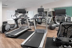 A gym with treadmills, ellipticals, and exercise balls. - Holiday Inn Express Hotel & Suites Uvalde by IHG (Uvalde)