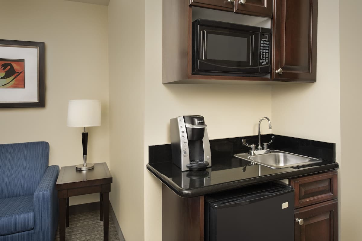 desk, blackout curtains, iron/ironing board, rollaway beds