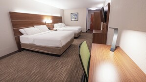 A hotel room with two beds, a desk, and a chair. - Holiday Inn Express Hotel & Suites East Lansing by IHG (East Lansing)