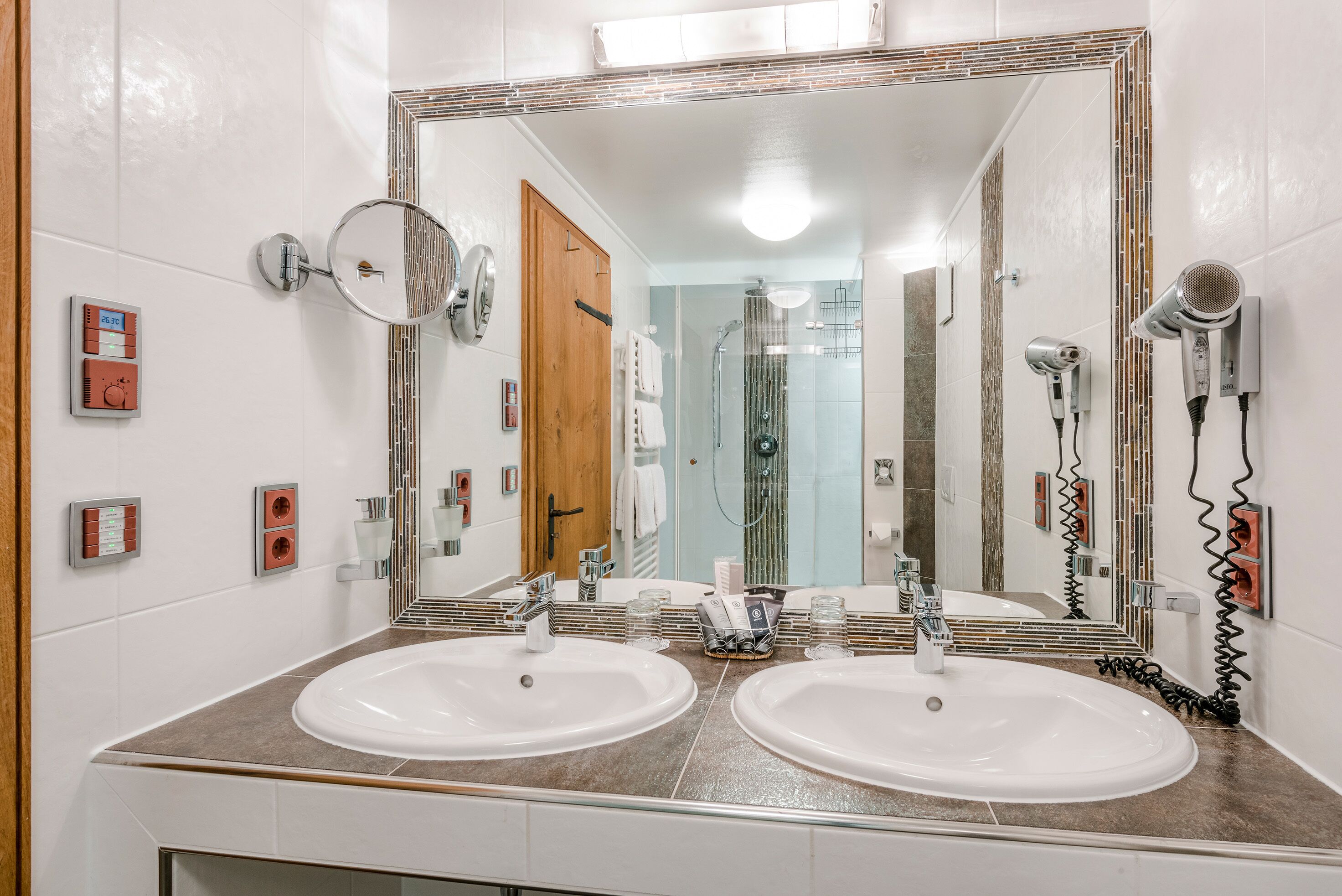 junior suite, 1 bedroom, lake view | bathroom | shower, free toiletries, hair dryer, bathrobes