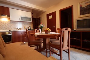 Apartment for 4 - 5 Persons | Living area | Flat-screen TV - Apartments Ivana (Baska Voda)