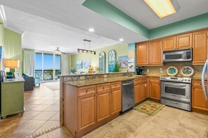 Condo, 4 Bedrooms | Private kitchen | Coffee/tea maker, cookware/dishes/utensils, dining tables