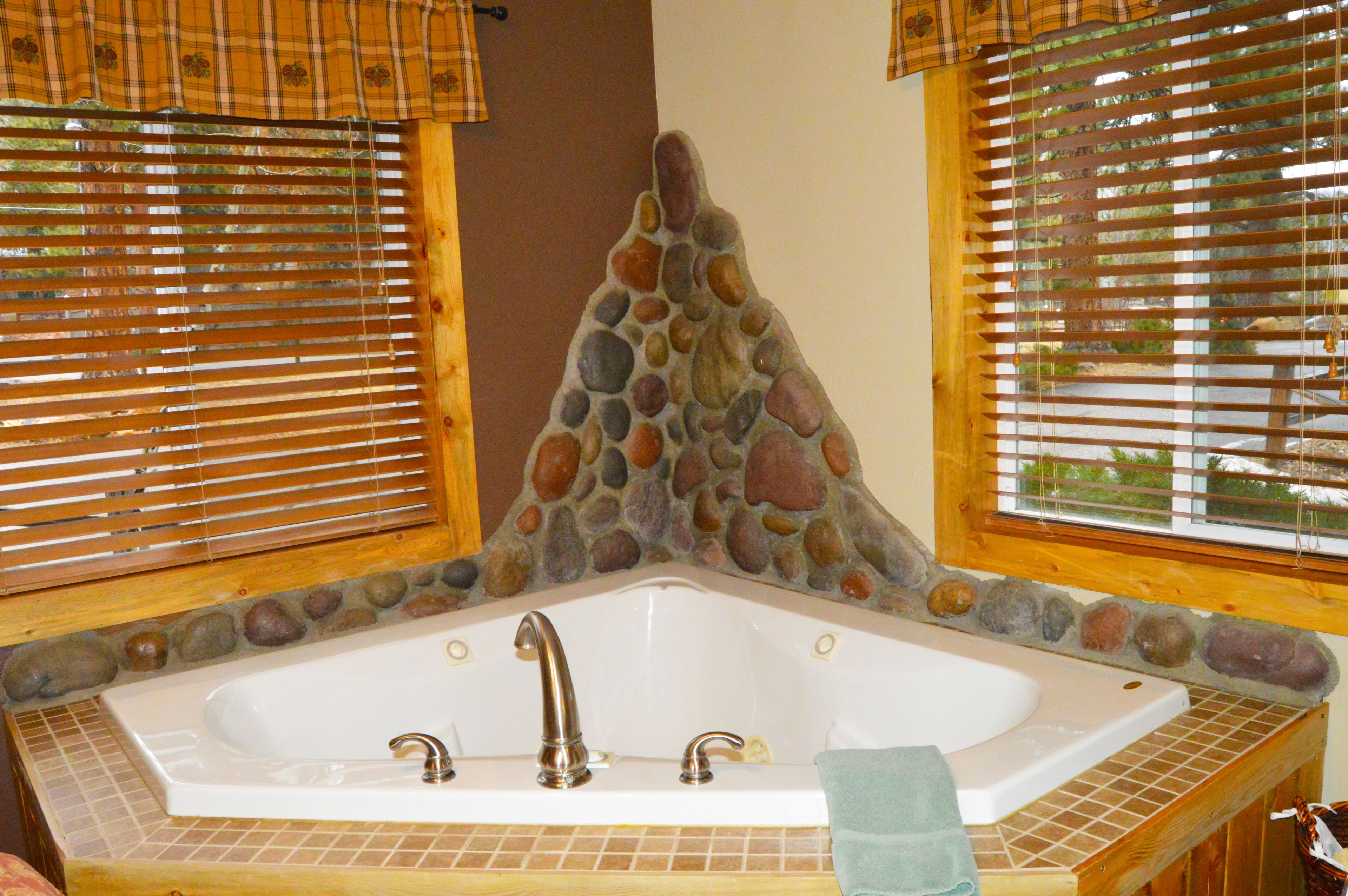 luxury cabin, 1 king bed, jetted tub, river view | jetted bathtub