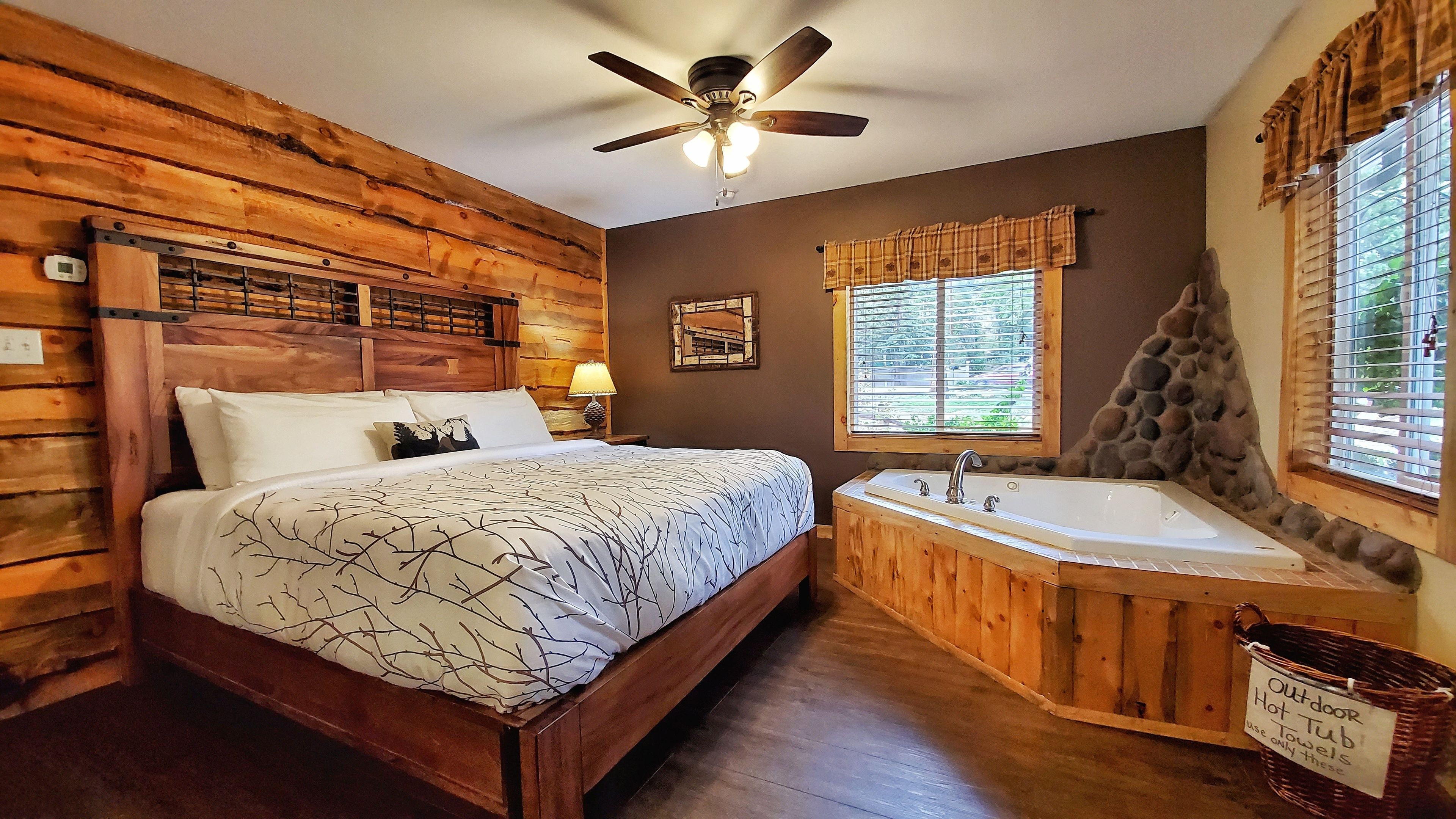 Luxury Cabin, 1 King Bed, Jetted Tub, River View | Hypo-allergenic bedding, pillowtop beds, individually decorated
