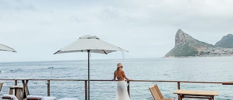 Outdoor pool, pool umbrellas, sun loungers