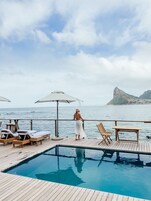 Outdoor pool, pool umbrellas, sun loungers