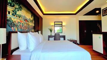 Suite junior | 1 habitación, minibar y caja de seguridad en la habitación