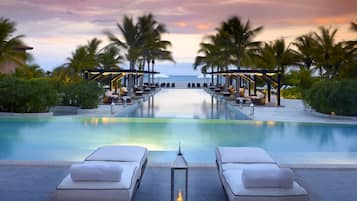 12 outdoor pools, cabanas (surcharge), pool umbrellas