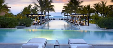 12 outdoor pools, cabanas (surcharge), pool umbrellas