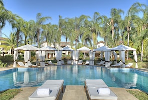 12 outdoor pools, cabanas (surcharge), pool umbrellas
