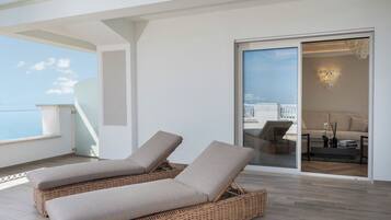 Superior Suite, Sea View | Minibar, in-room safe, desk, laptop workspace