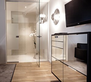 Junior Studio Suite, 1 King Bed, Non Smoking, Private Bathroom | Living area | 28-inch LCD TV with satellite channels, TV, books - Casati Hotel – Adults Only (Budapest)