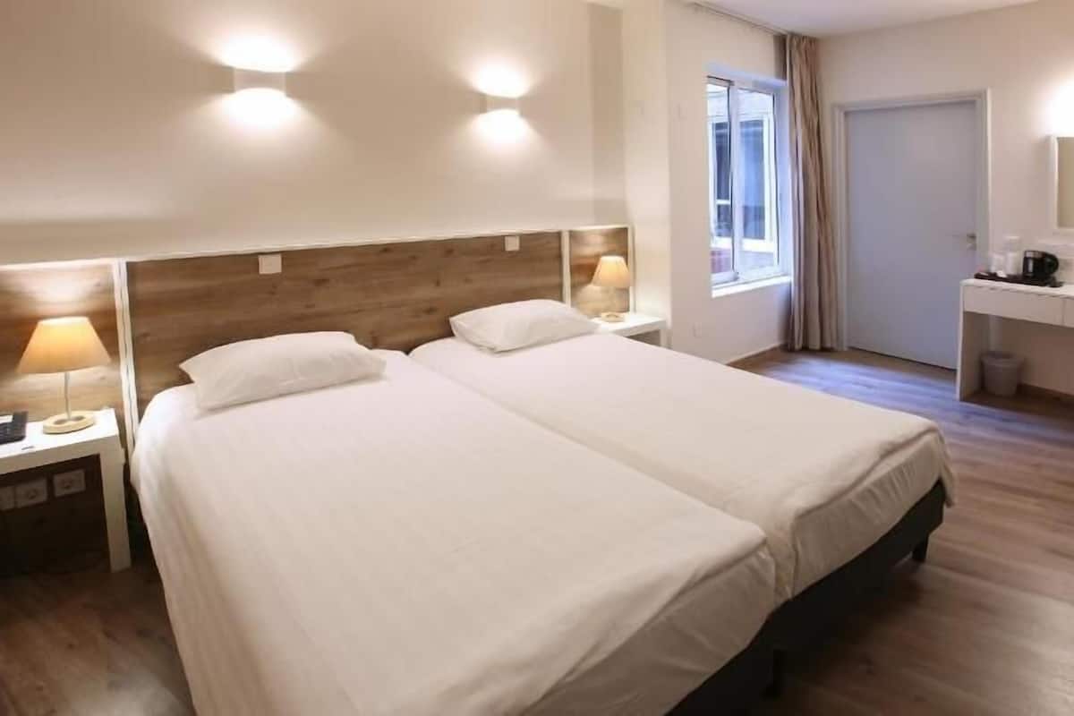 Premium bedding, in-room safe, individually decorated, desk