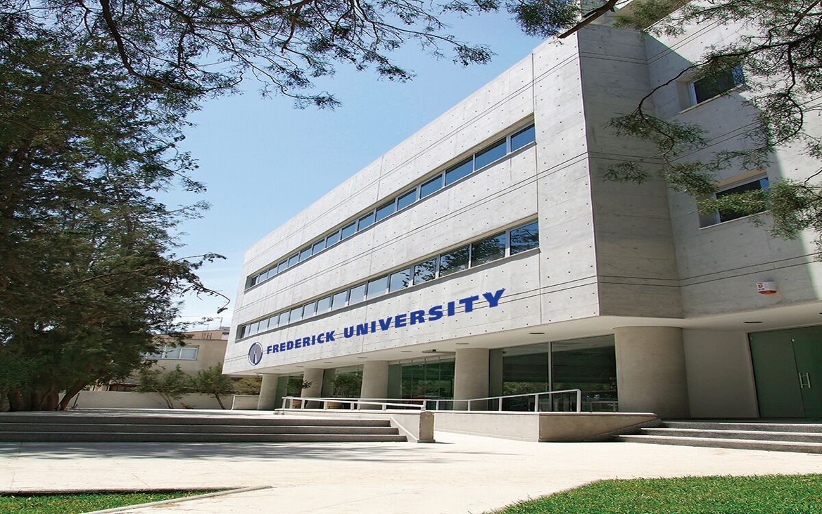 A modern building with the name 'Frederick University' prominently displayed.