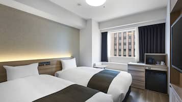 Down duvets, desk, blackout curtains, iron/ironing board (on request)