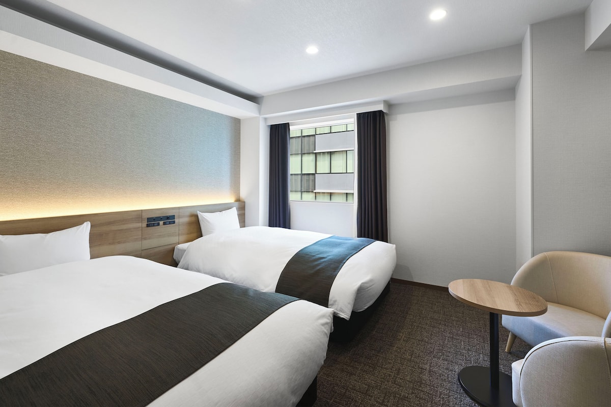 Down comforters, desk, blackout drapes, soundproofing