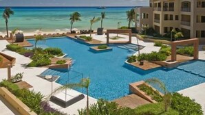 Outdoor pool - Encanto El Faro Luxury Ocean Front Condo-Hotel (Playa del Carmen)