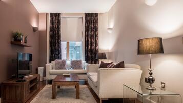 Appartement Standard, 1 trÚs grand lit | Coin séjour
