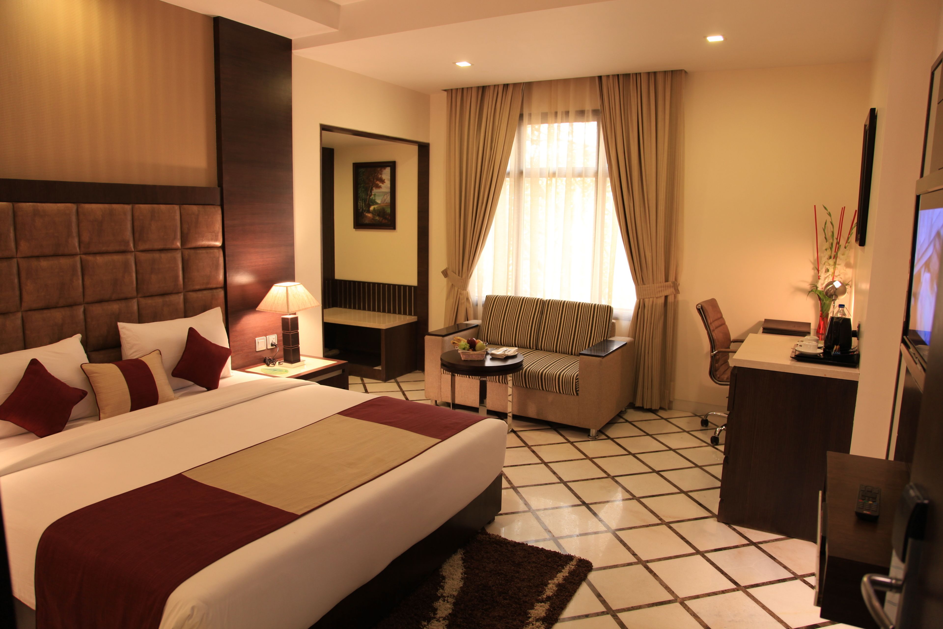 Executive Room | Premium bedding, minibar, in-room safe, desk