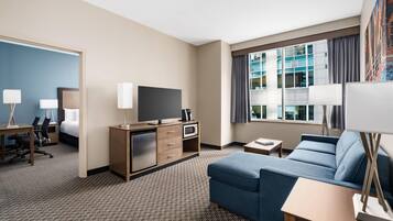 Premium bedding, desk, iron/ironing board, free cribs/infant beds