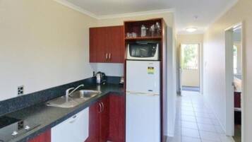 Executive 1 Bedroom Spa | Private kitchen | Fridge, microwave, stovetop, electric kettle