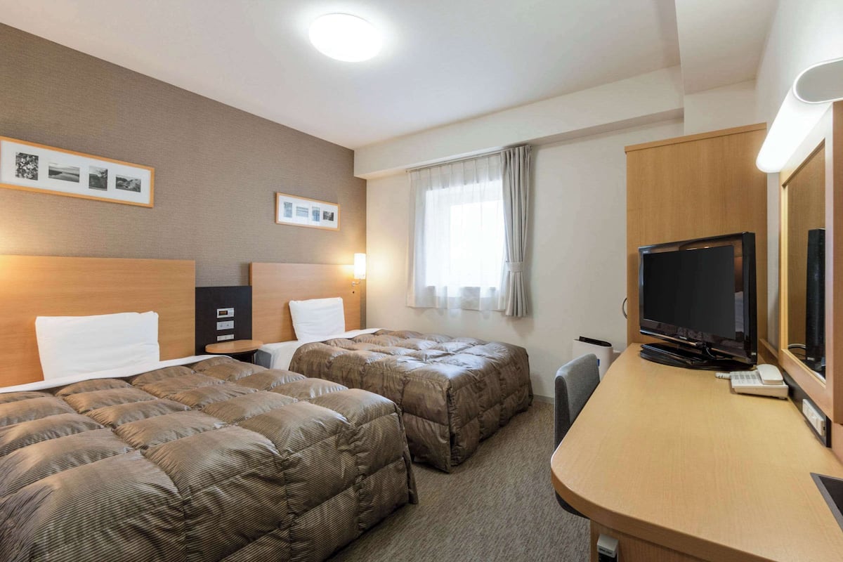 Standaard Twin kamer, 2 eenpersoonsbedden, niet-roken | Luxe beddengoed, een bureau, verduisterende gordijnen