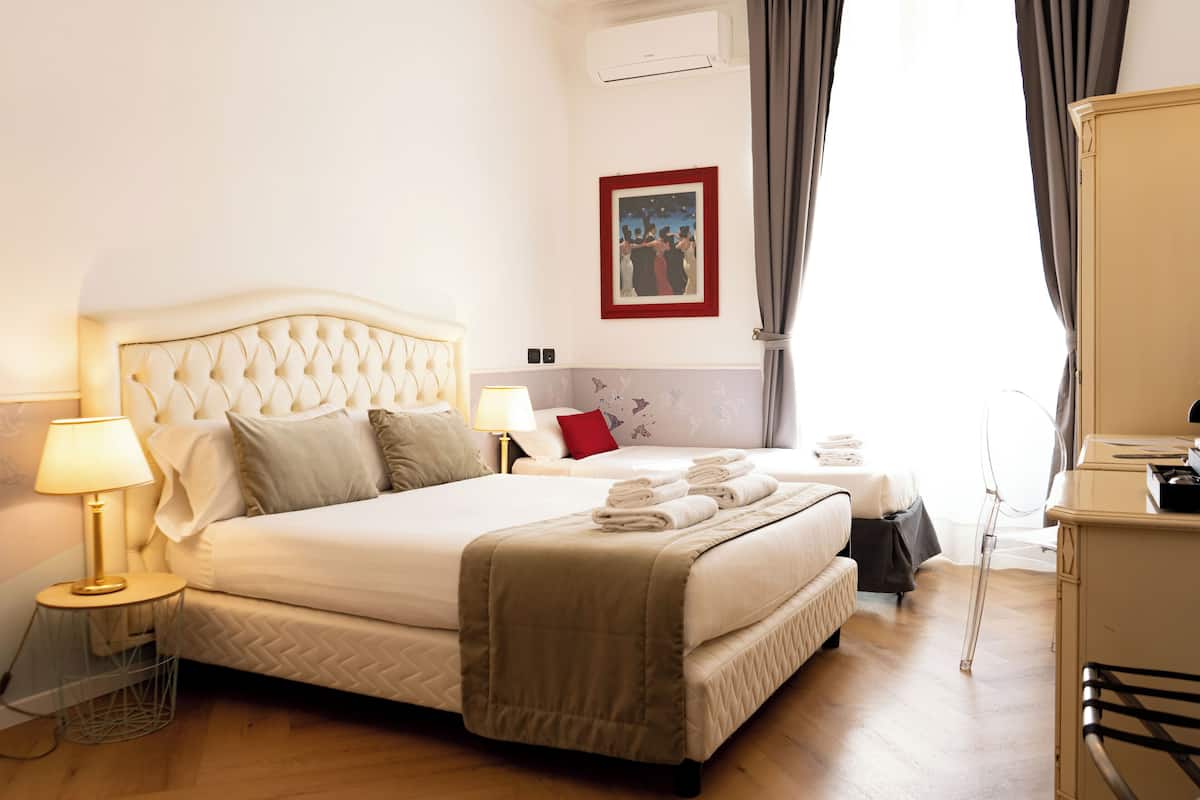 Premium bedding, down duvets, memory-foam beds, in-room safe