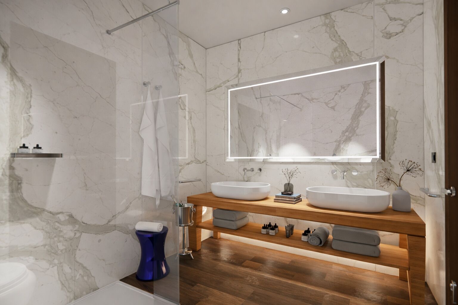 Ein modernes Badezimmer mit zwei Waschbecken, einem großen Spiegel und einer Dusche.