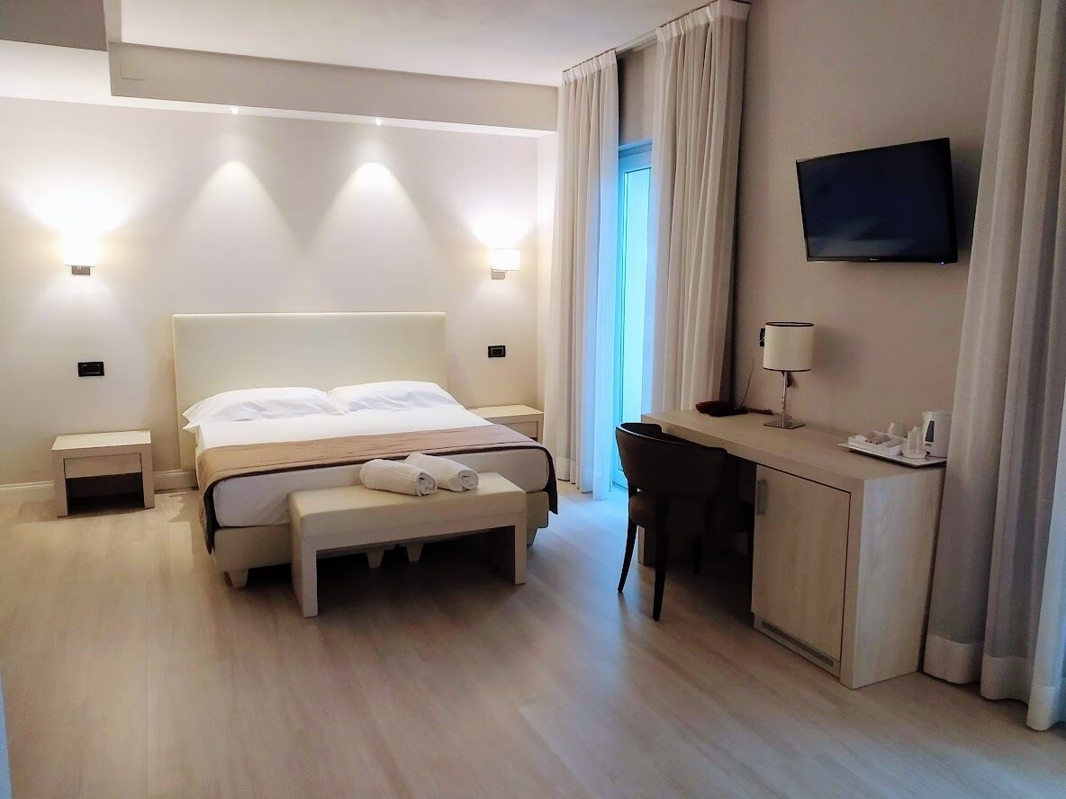 deluxe quadruple room, terrace | 1 bedroom, minibar, in-room safe, blackout curtains