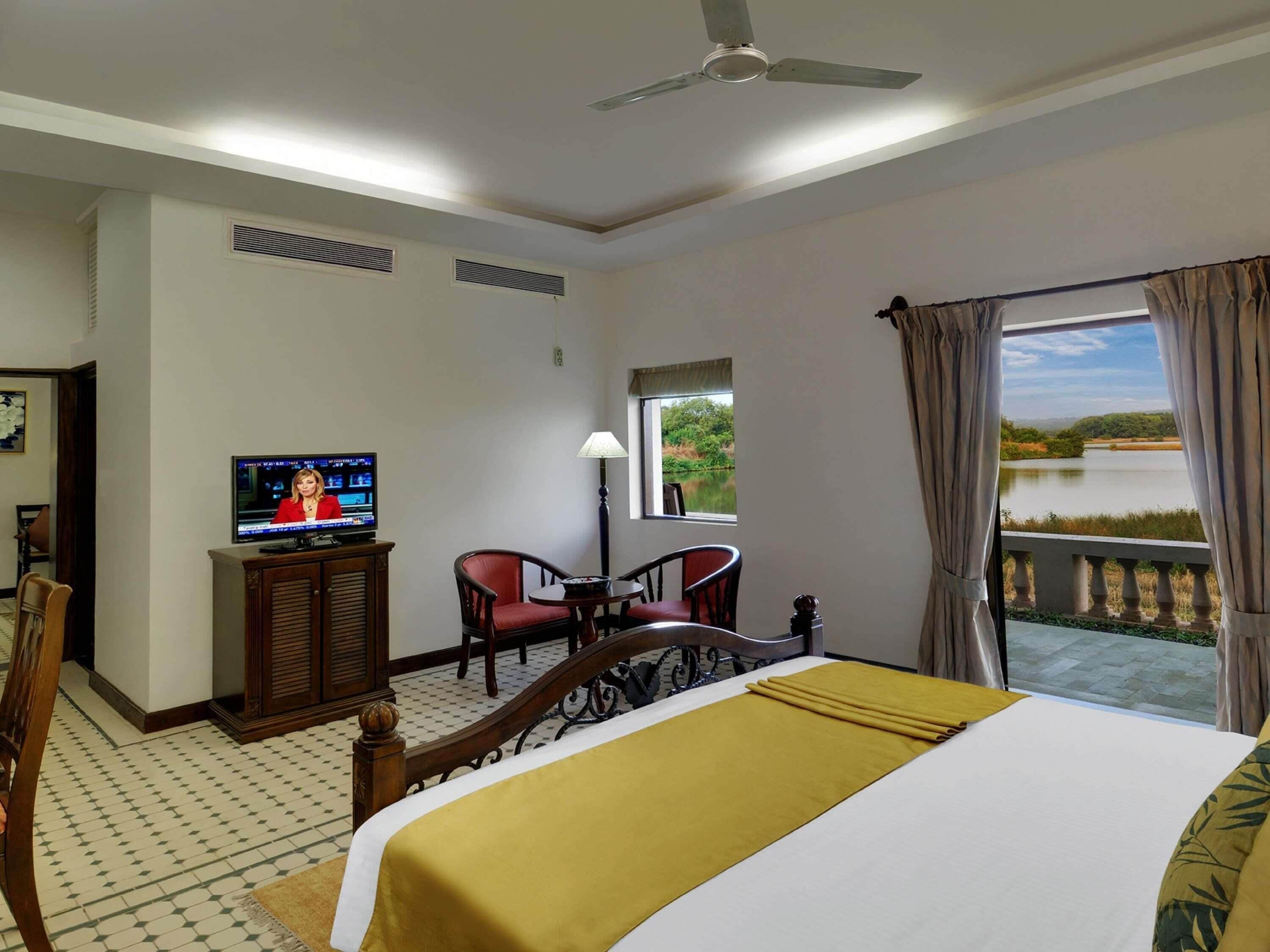 Deluxe Suite, 1 Double Bed, River View (Cozy Sitout) | Egyptian cotton sheets, premium bedding, Select Comfort beds, minibar