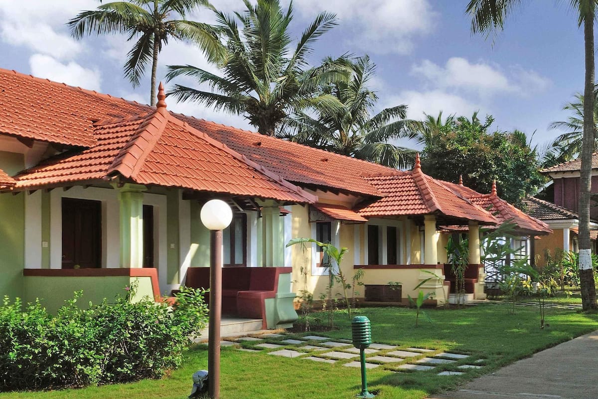 Villa Room with Twin beds, cosy sitout area with Garden Views