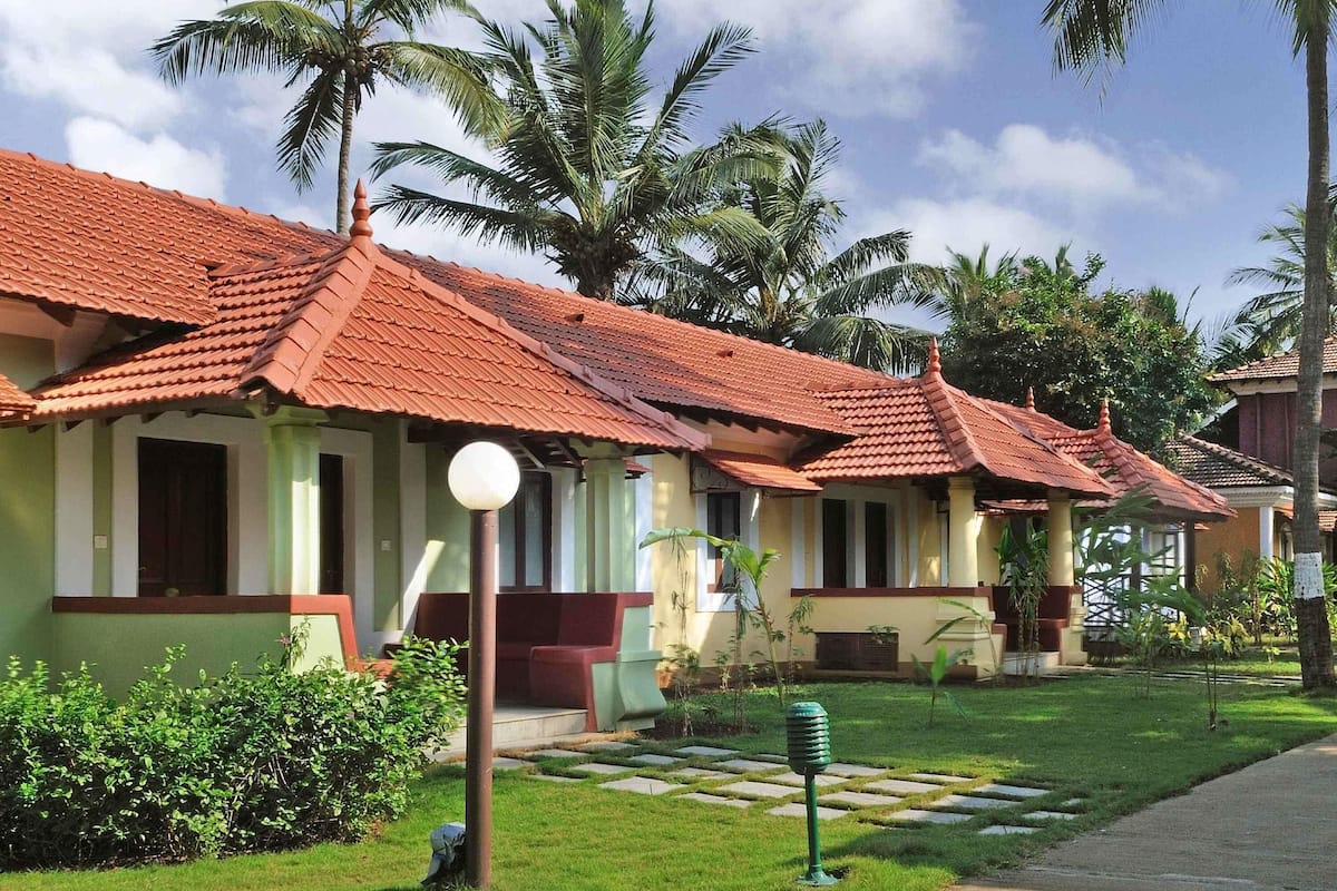 Villa Room with Twin beds, cosy sitout area with Garden Views